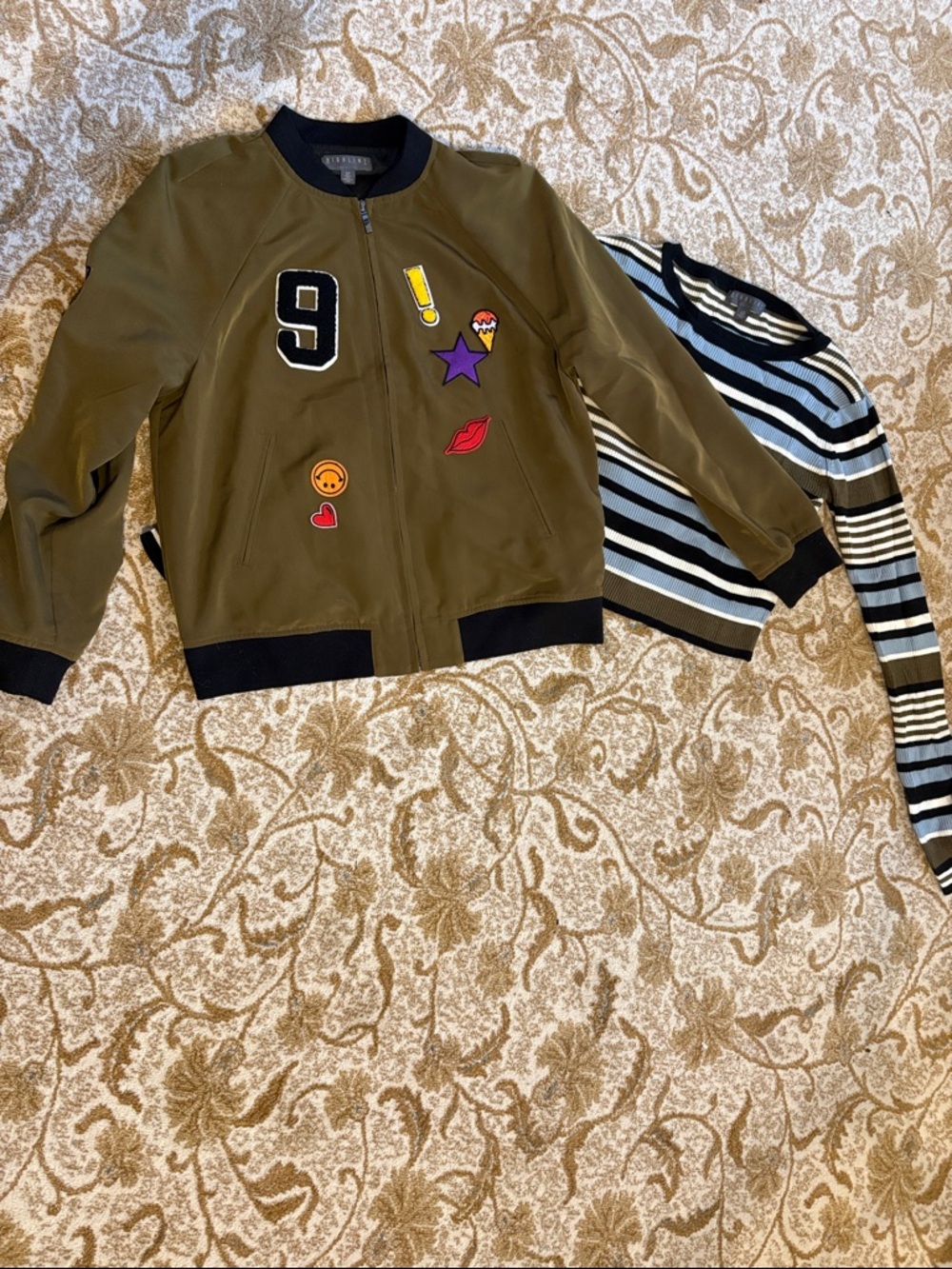 Get the look.  Olive Green Patch Bomber Jacket - and long sleeve top set.